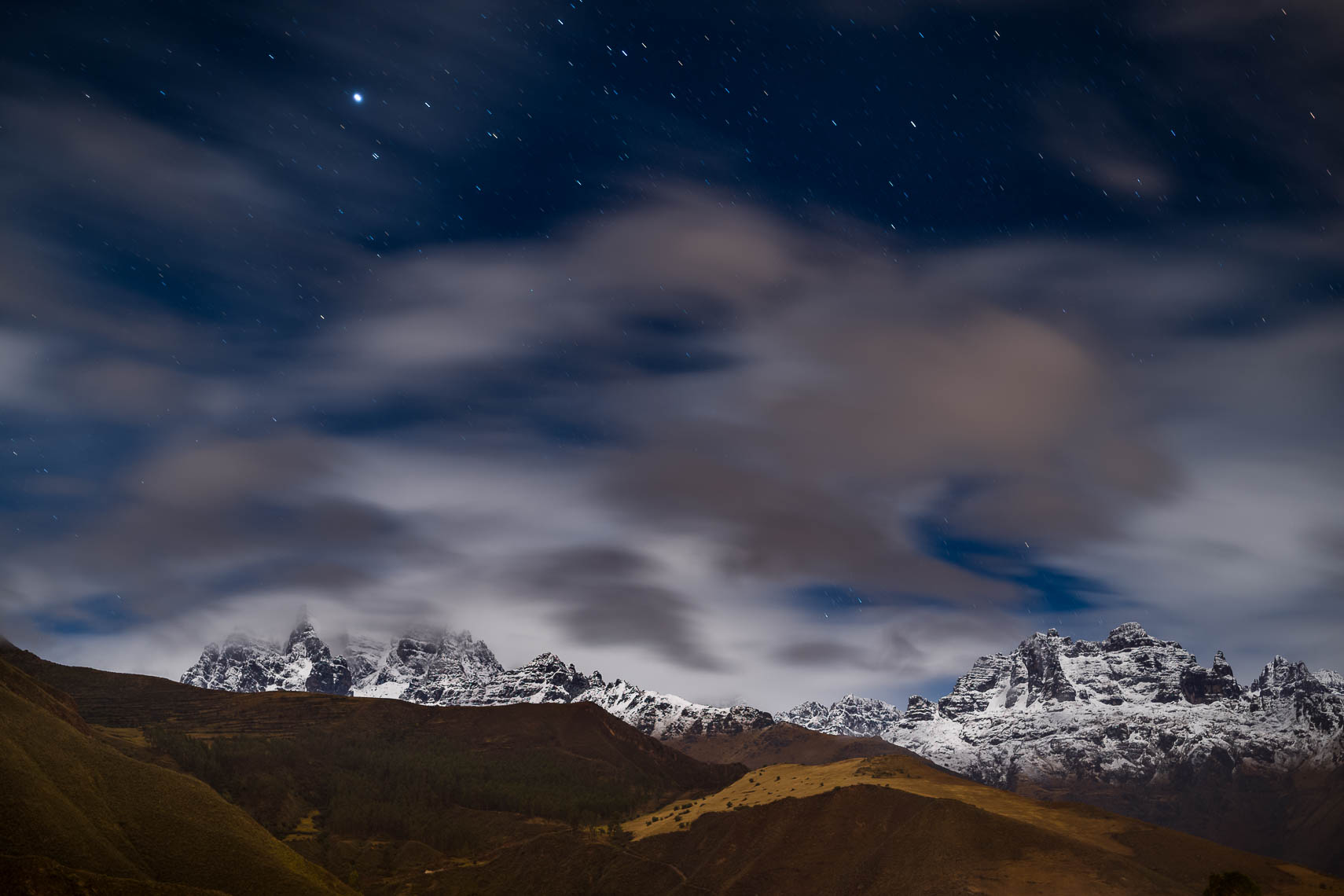 Stars Clouds Skies and Snow Over the Sacred Valley